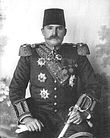 https://upload.wikimedia.org/wikipedia/commons/thumb/9/97/Essad_Pasha_Toptani.jpg/110px-Essad_Pasha_Toptani.jpg